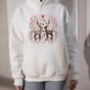 100 Romantic deer cross stitch design displayed on pullover