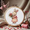 Spring bunny girl needlepoint chart in embroidery hoop