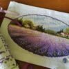 120011242_3261397407263105_230892694255522767_o Lavender landscape cross stitch surrounded by dried flowers, peaceful summer embroidery
