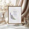 13 Framed lavender wedding wreath cross stitch pattern with personalized couple names and date, elegant purple floral keepsake embroidery design