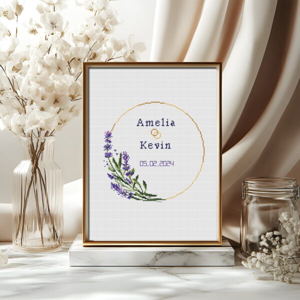 13 Framed lavender wedding wreath cross stitch pattern with personalized couple names and date, elegant purple floral keepsake embroidery design
