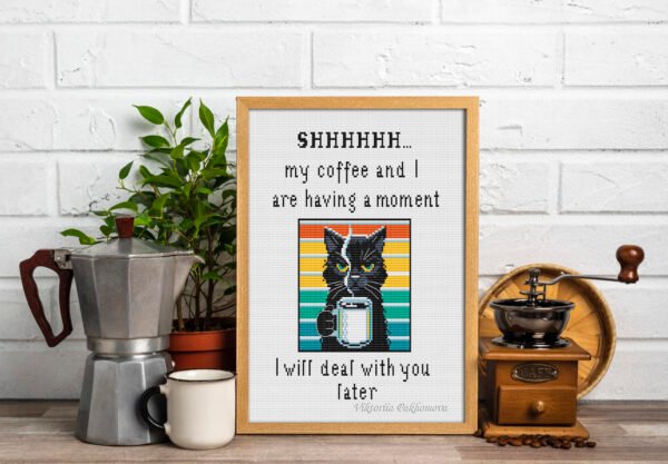 black cat embroidery holding a coffee mug framed mock up