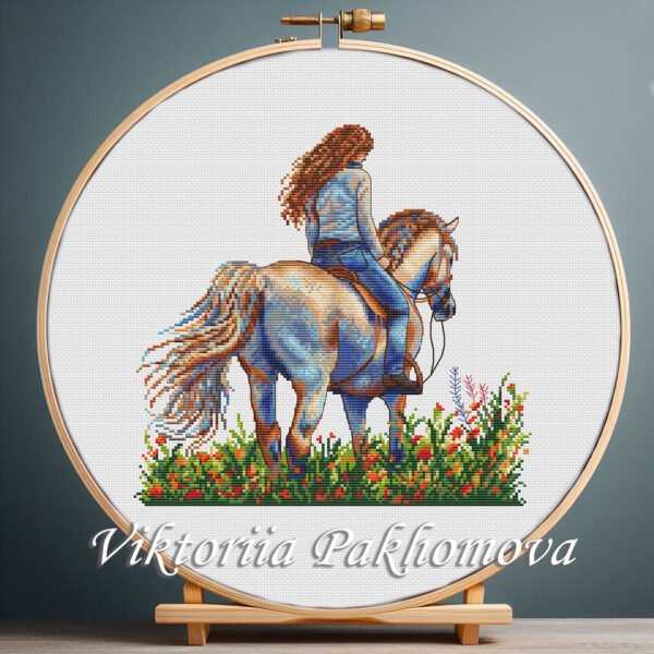 Girl riding a horse cross stitch pattern in embroidery hoop — floral nature desig