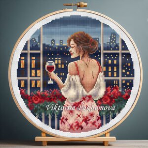 Woman on balcony with night city cross stitch pattern — romantic evening design