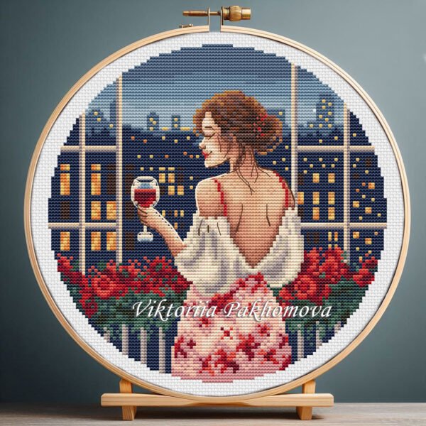 131 Woman on balcony with night city cross stitch pattern — romantic evening design