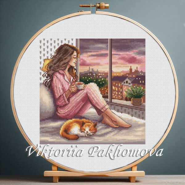 Girl with evening tea cross stitch pattern — sunset city view and ginger cat design