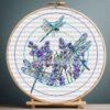 131 Lavender dragonfly cross stitch pattern in a wooden hoop with purple flowers and colorful dragonflies