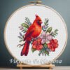 131 Red cardinal cross stitch pattern with floral details