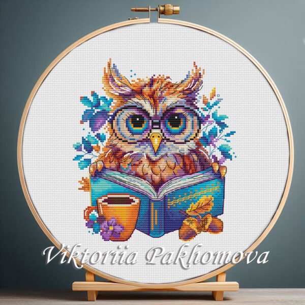 Colorful owl cross stitch pattern with glasses, reading a book, autumn leaves and cozy details, embroidery design by Viktoriia Pakhomova