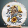 Tawny owl cross stitch pattern with sunflowers and moon glow, detailed autumn embroidery design by Viktoriia Pakhomova