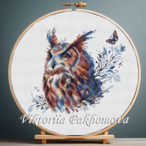 Detailed owl cross stitch pattern with branches and butterfly, enchanted forest embroidery