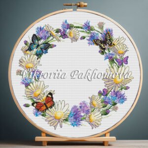 131 Cornflower wreath cross stitch pattern with butterflies and summer florals in embroidery hoop