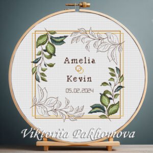131 Personalized wedding wreath cross stitch pattern with floral frame, couple names, and wedding date in embroidery hoop