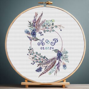 131 Boho wedding wreath cross stitch pattern with blue florals in embroidery hoop