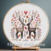 131 Romantic Deer cross stitch pattern displayed in a wooden embroidery hoop with autumn folk motifs