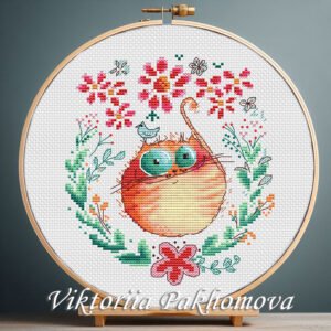 131 Cross stitch embroidery of a ginger cat inside a floral wreath with bright flowers and green leaves, displayed in a wooden hoop