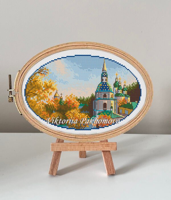 Vydubytskyi Monastery cross stitch pattern in embroidery hoop, colorful Kyiv autumn landscape