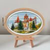 132 Dracula’s Castle cross stitch pattern in embroidery hoop, Transylvania Romania gothic landscape