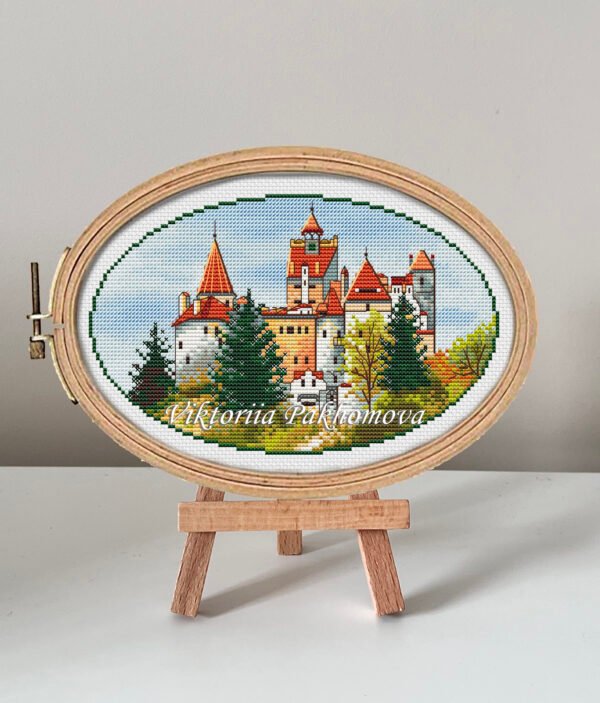 132 Dracula’s Castle cross stitch pattern in embroidery hoop, Transylvania Romania gothic landscape