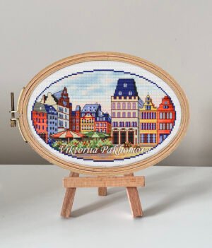 Trier Germany cross stitch pattern in embroidery hoop, vibrant European city landscape