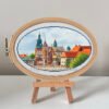 Krakow castle cross stitch pattern in embroidery hoop, colorful European cityscape design