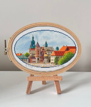 Krakow castle cross stitch pattern in embroidery hoop, colorful European cityscape design
