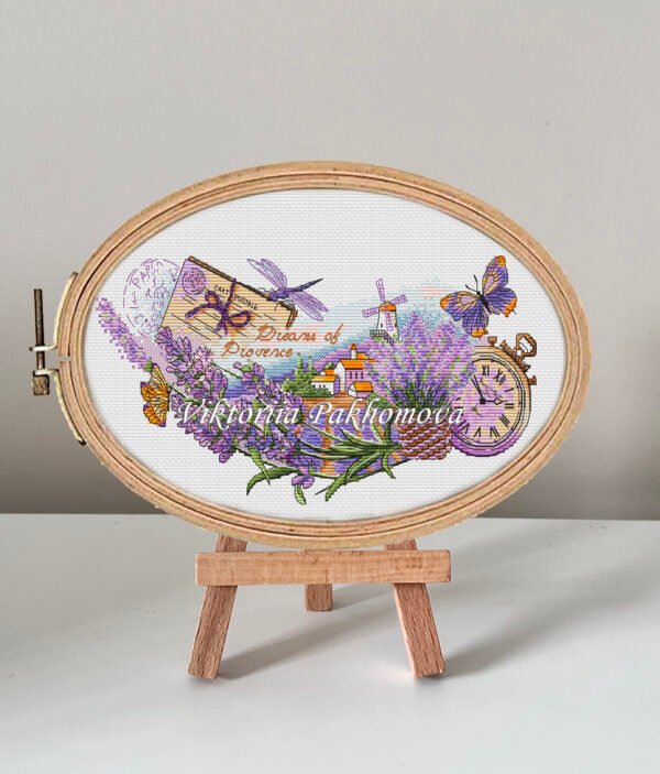 Lavender fields cross stitch pattern with dragonfly and butterfly in a wooden hoop, summer floral landscape design