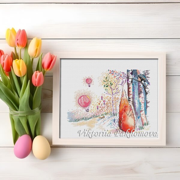 framed fox and raven embroidery with bright trees and balloons