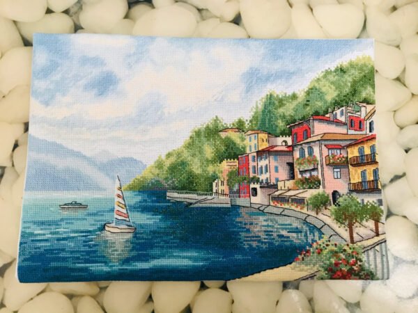 Italian lake Como landscape cross stitch in a frame, bright Lake Como scenery with boats and mountains, summer embroidery artwork
