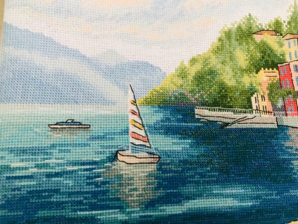 Italian lake Como landscape cross stitch in a frame, bright Lake Como scenery with boats and mountains, summer embroidery artwork