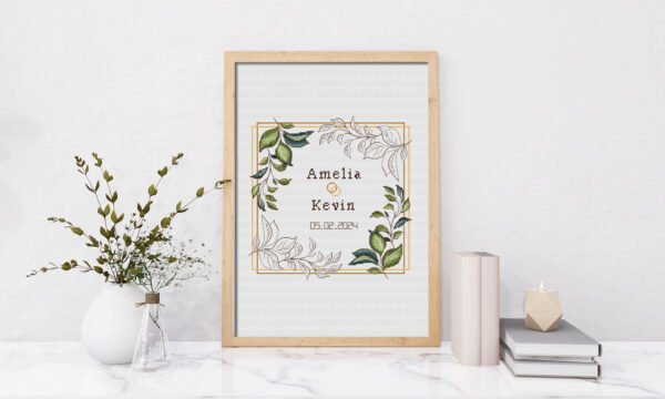 Poster Frame in living room Psd Mockup Framed wedding wreath cross stitch pattern with personalized couple names and date, elegant greens keepsake embroidery design