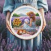 Girl stitching embroidery in lavender field cross stitch pattern — peaceful nature design