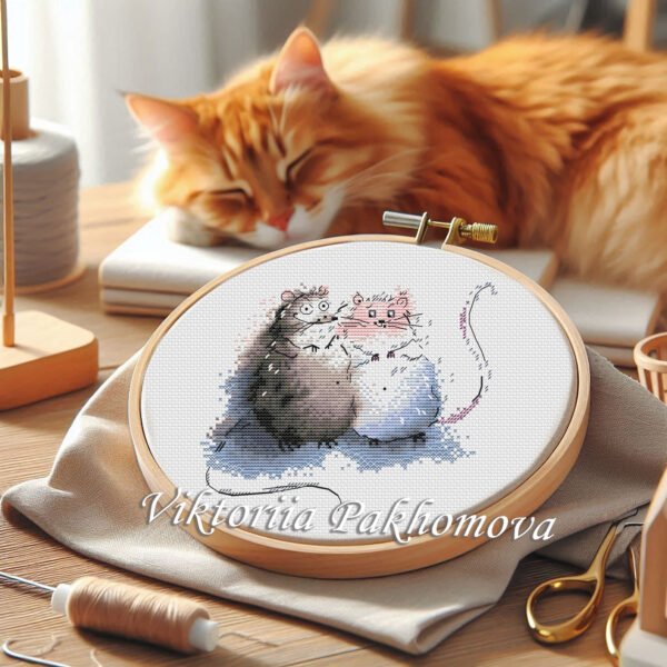 whimsical animal couple cross stitch design in a hoop