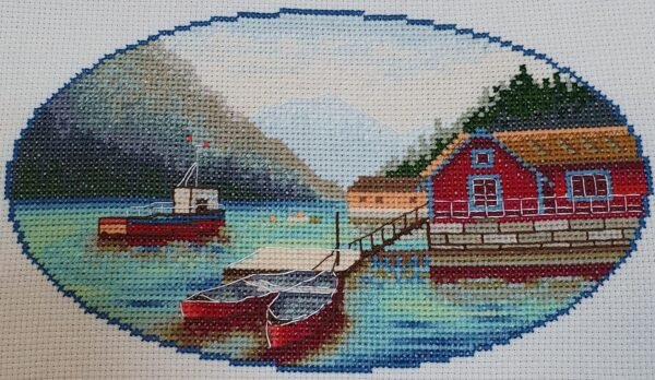 153682819_1726701690832882_659100957708886827_n Norway lake cross stitch displayed with cozy decor, peaceful mountain landscape embroidery