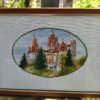 185047339_290219956114405_5312977458100005788_n Framed Dracula Castle cross stitch artwork with European towers and forest landscape