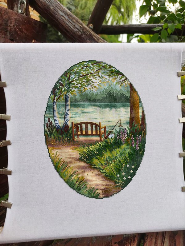 227491304_613567682958276_8412603504069850483_n Finished embroidery Summertime lake landscape cross stitch pattern with forest trees and wooden bench
