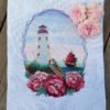 Summer lighthouse cross stitch artwork with peonies and seaside landscape finished embroidery