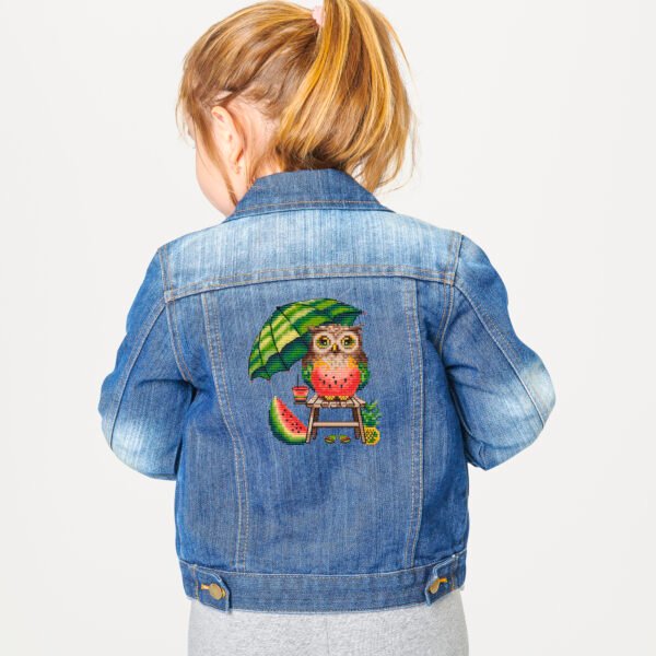 Denim jacket with colorful watermelon owl embroidery design, whimsical summer bird illustration
