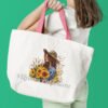 Girl with sunflower cross stitch design stitched on tote dag