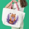 Woman with white tote bag Fox in lavender cross stitch design displayed on tote bag