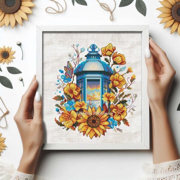 floral lantern cross stitch design framed