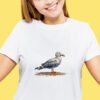 whimsical seagull cross stitch design on t-shirt