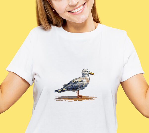 whimsical seagull cross stitch design on t-shirt