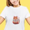 Caucasian young woman's half-length portrait on yellow background Romantic cat cross stitch design displayed on t-shirt
