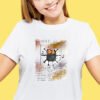 Finished cross stitch artwork of a humorous black cat in a Da Vinci‑style pose with bold lines and soft background tones on t-shirt