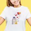 finished cross stitch artwork featuring a cute romantic cat with colorful hearts on t-shirt