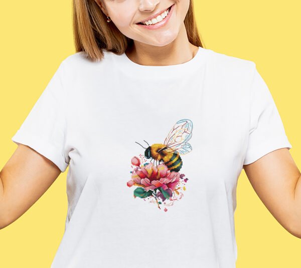 Peony and bee cross stitch design stitched on T-shirt