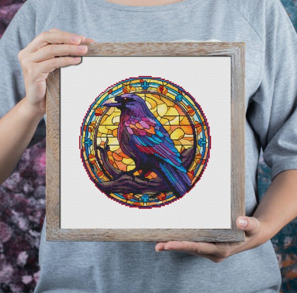 Raven stained glass cross stitch pattern framed art mockup