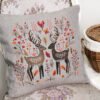 56 Romantic deer cross stitch design displayed on decorative pillow