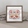 65 Framed cross stitch artwork of two romantic swans forming a heart, surrounded by colorful Scandinavian folk art flowers